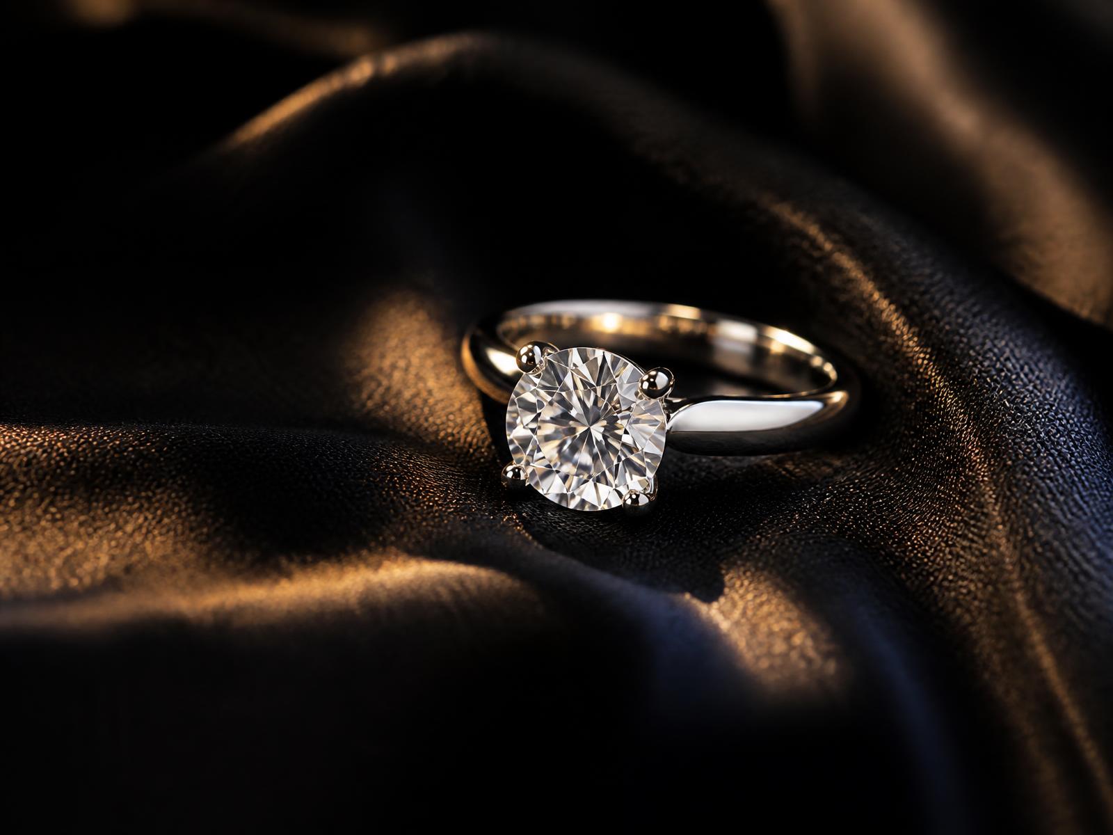 Luxverra platinum solitaire lab-grown diamond engagement ring on black silk